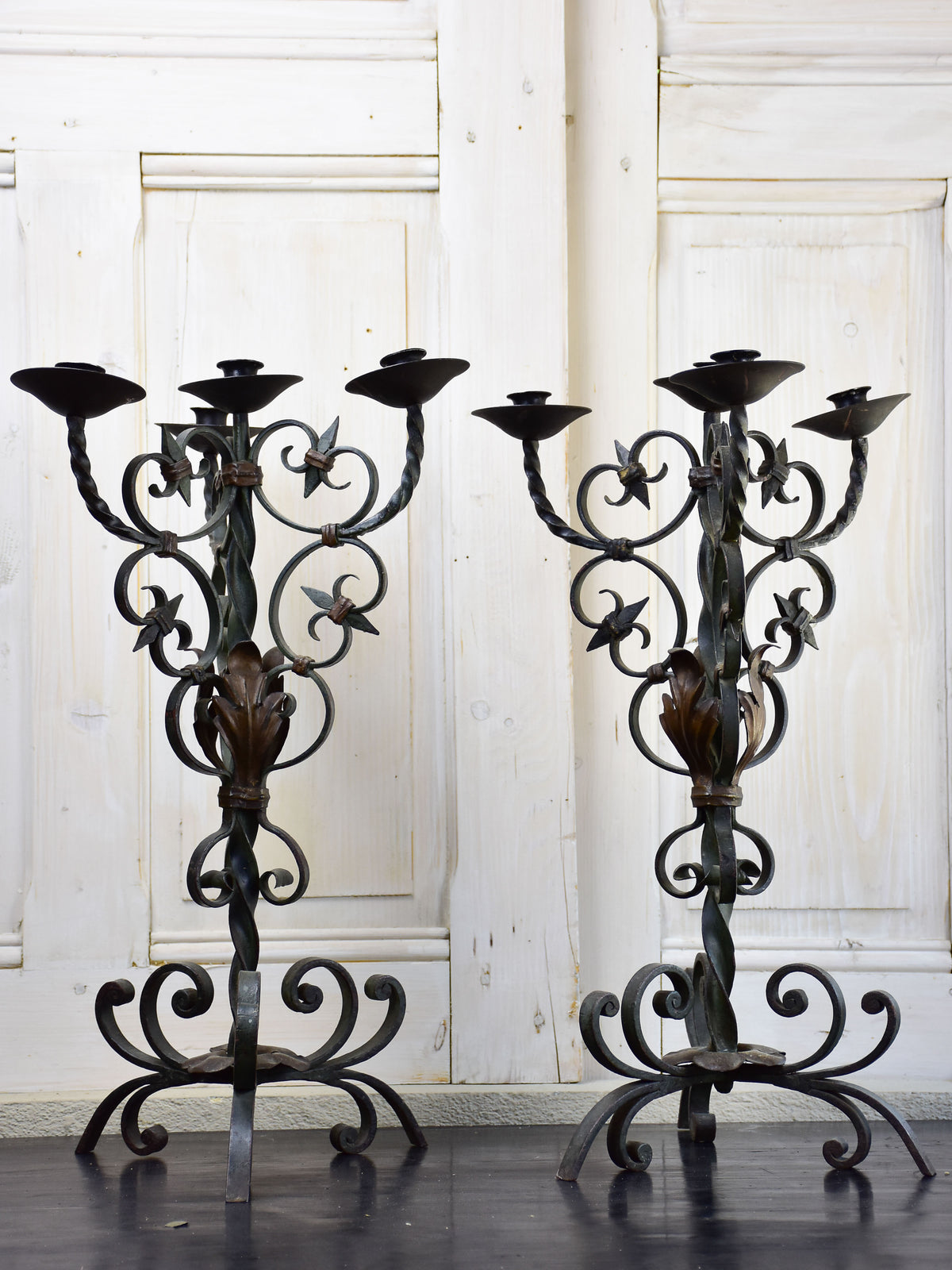 Pair of antique French candlesticks - wrought iron