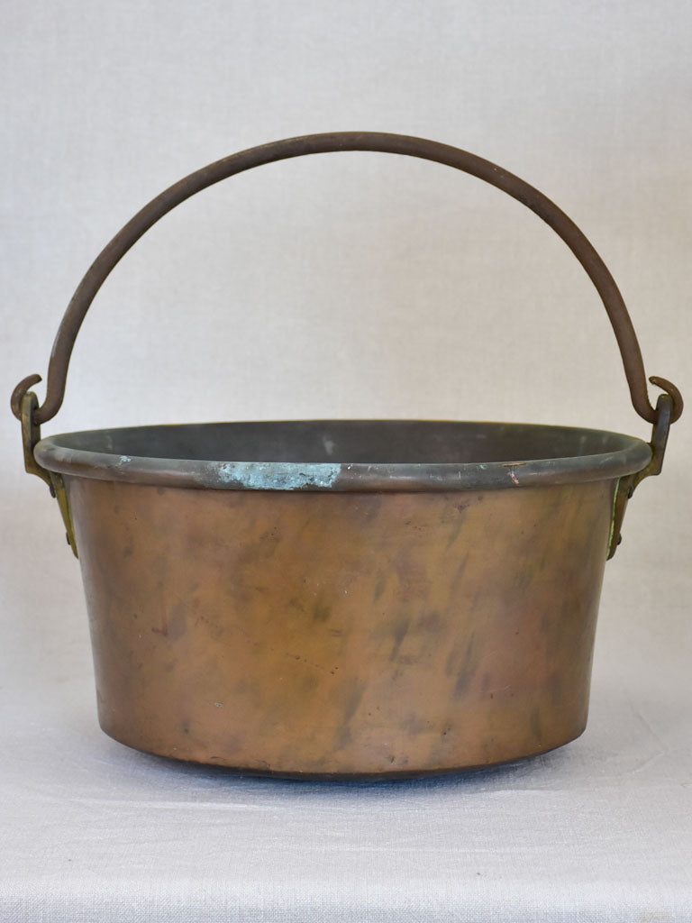 Broad French winemaker's copper with arching handle from the 19th century 17¼"