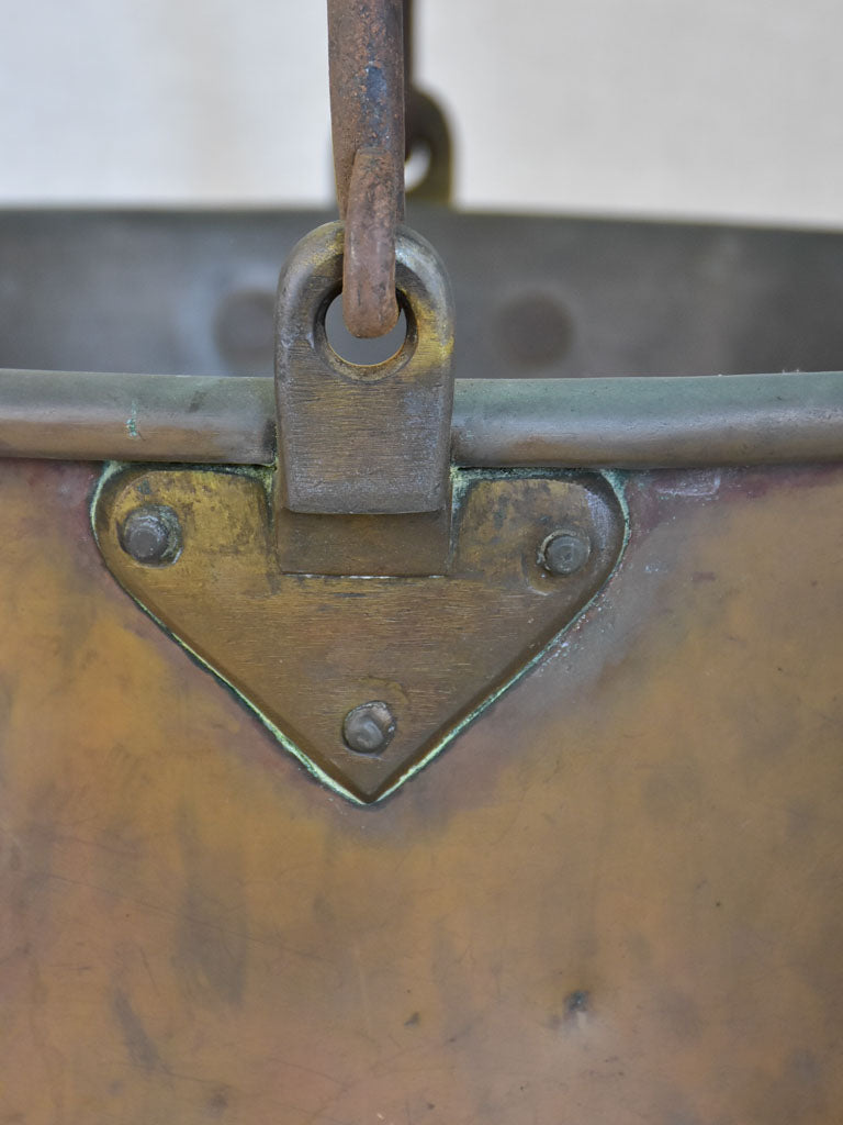 Broad French winemaker's copper with arching handle from the 19th century 17¼"