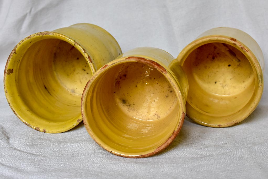 Collection of three antique French preserving pots with yellow glaze