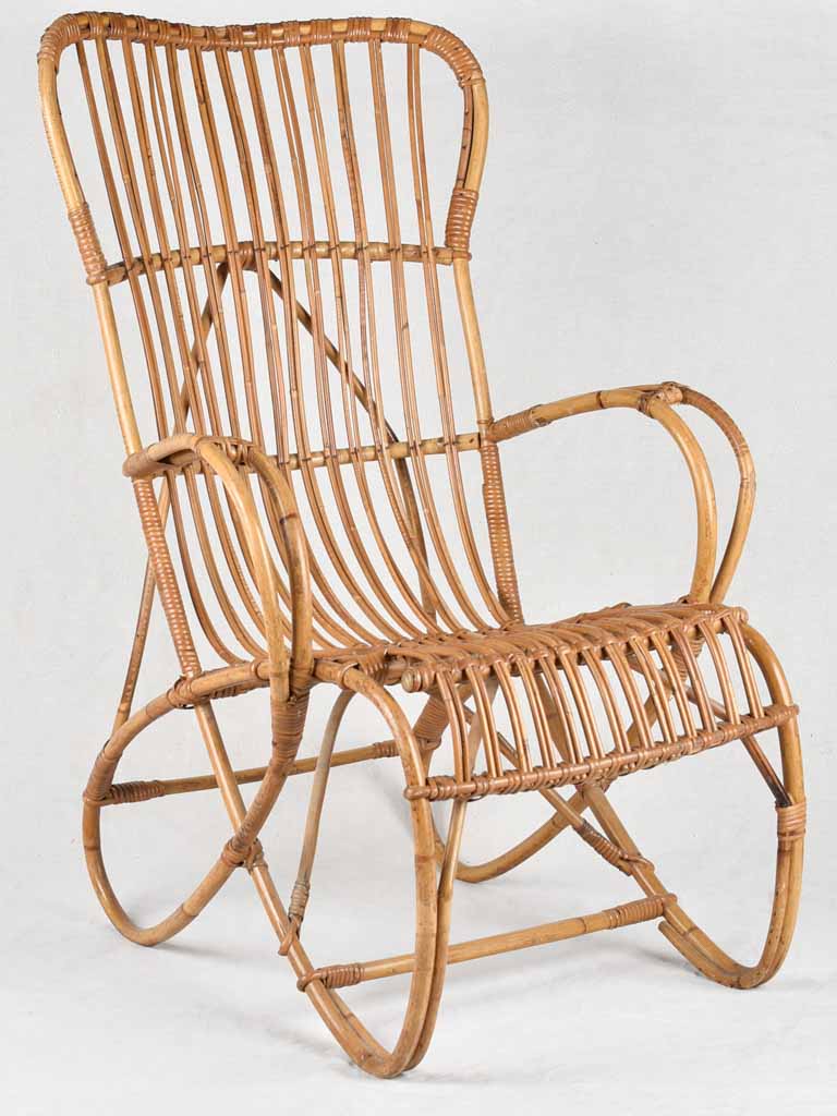 Antique wicker armchair, high back