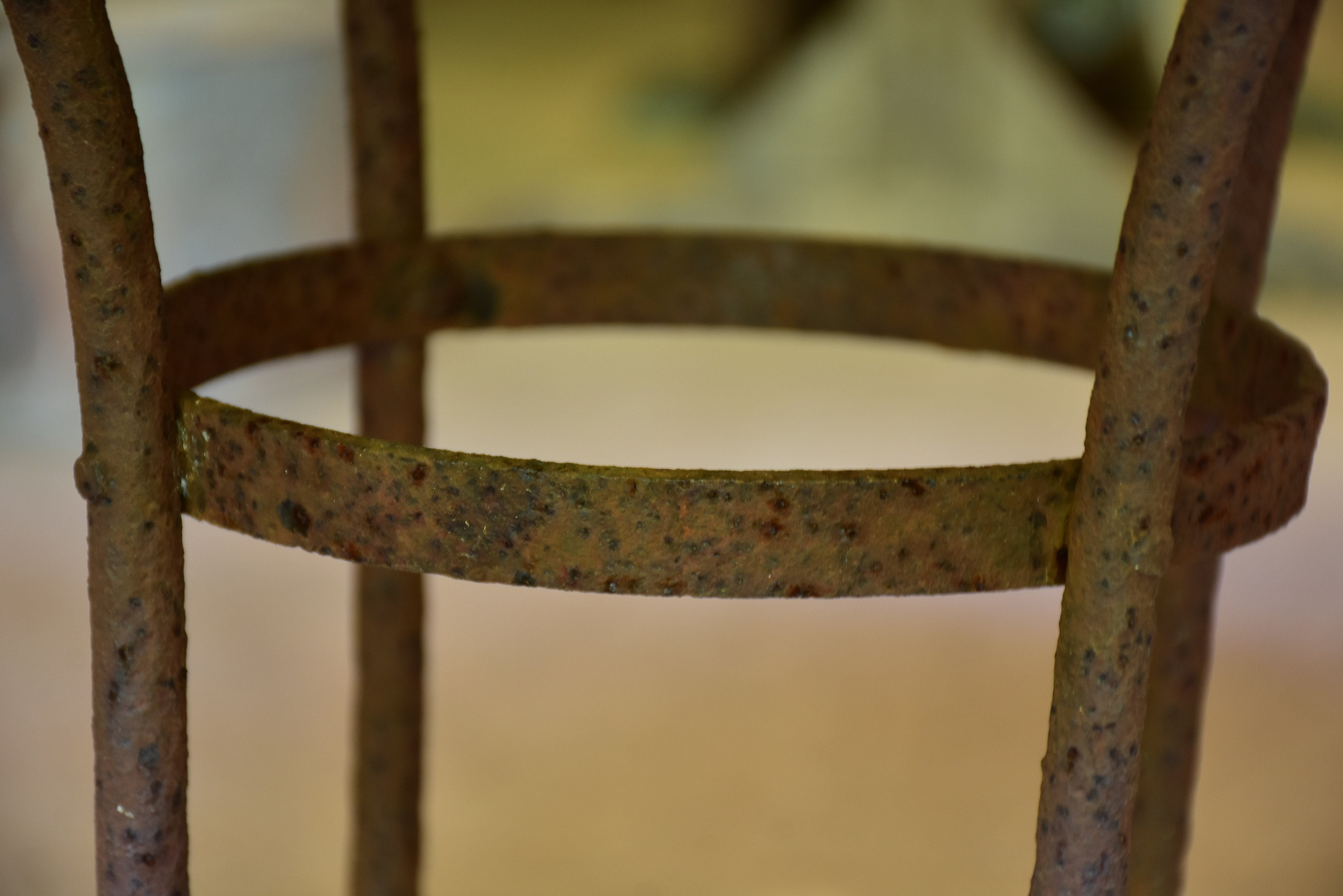 Round marble-top table with cast iron base