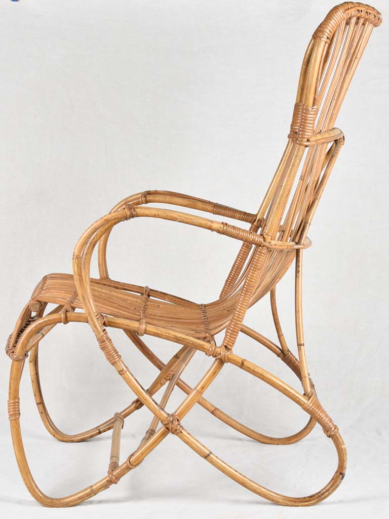 Aged high-back wicker armchair vintage