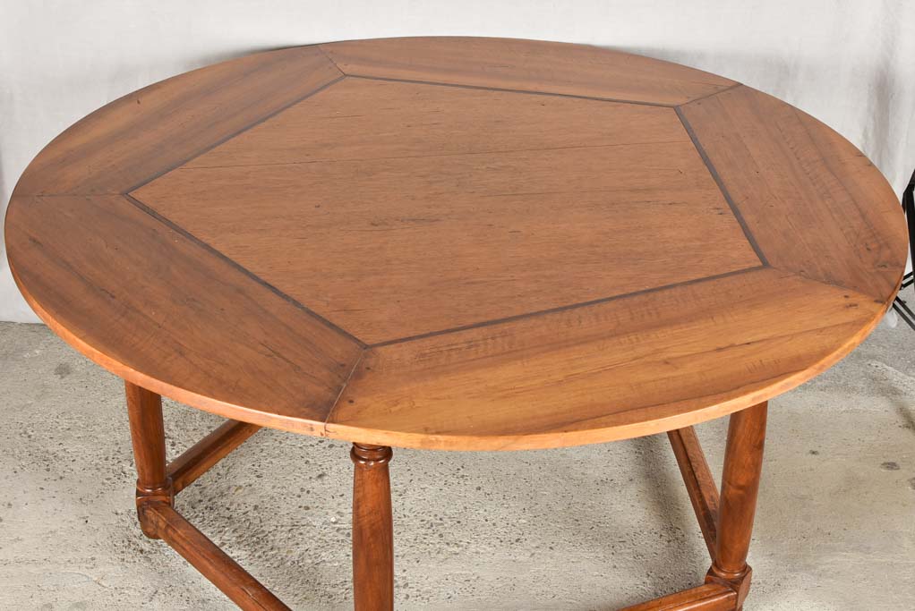 Sturdy walnut finish, round table