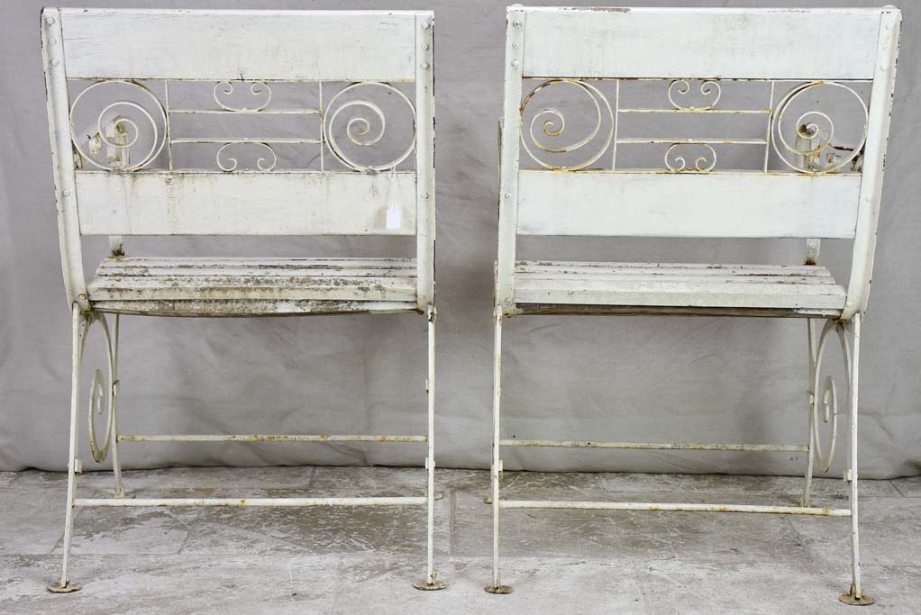 Pair of white 1930's French garden armchairs from Vichy