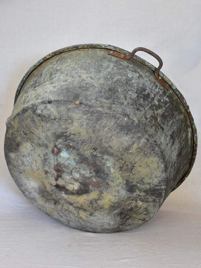 Broad antique French cauldron with two small handles and a drainage hole 30¼"