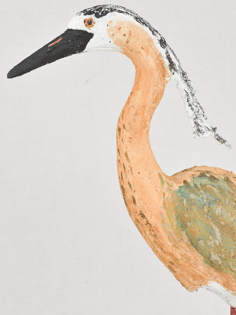 Aged mason's stone heron sculpture