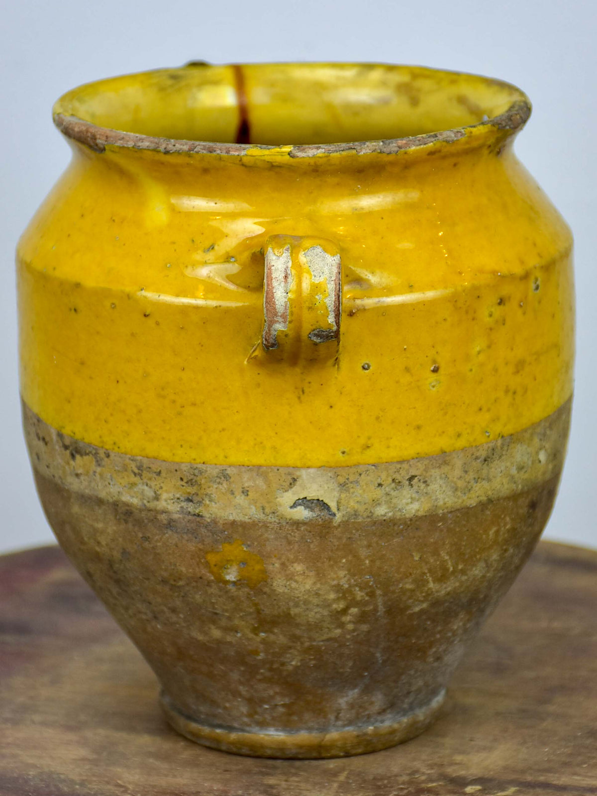 Small antique French confit pot with orange glaze - 7 ¼''