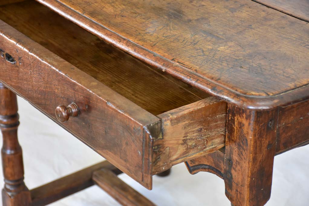 Louis XIII walnut side table with drawer and heart motif