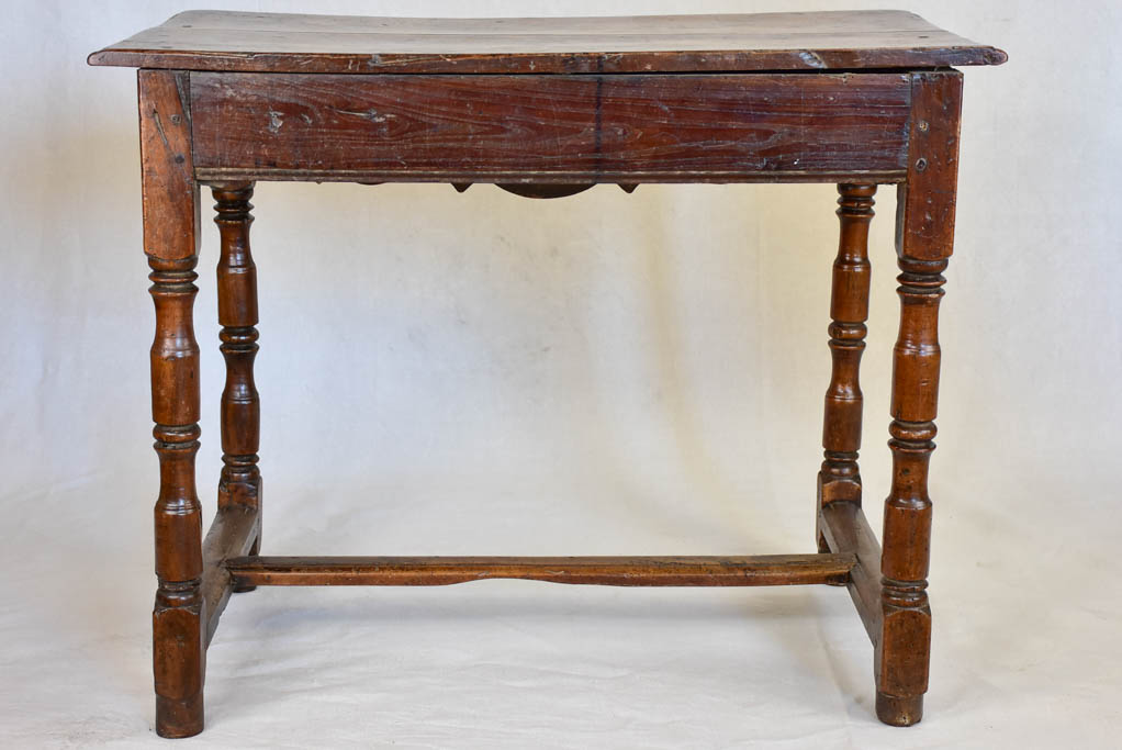 Louis XIII walnut side table with drawer and heart motif
