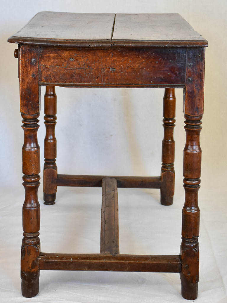 Louis XIII walnut side table with drawer and heart motif