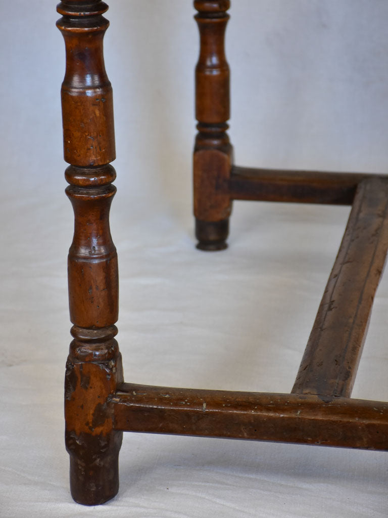 Louis XIII walnut side table with drawer and heart motif