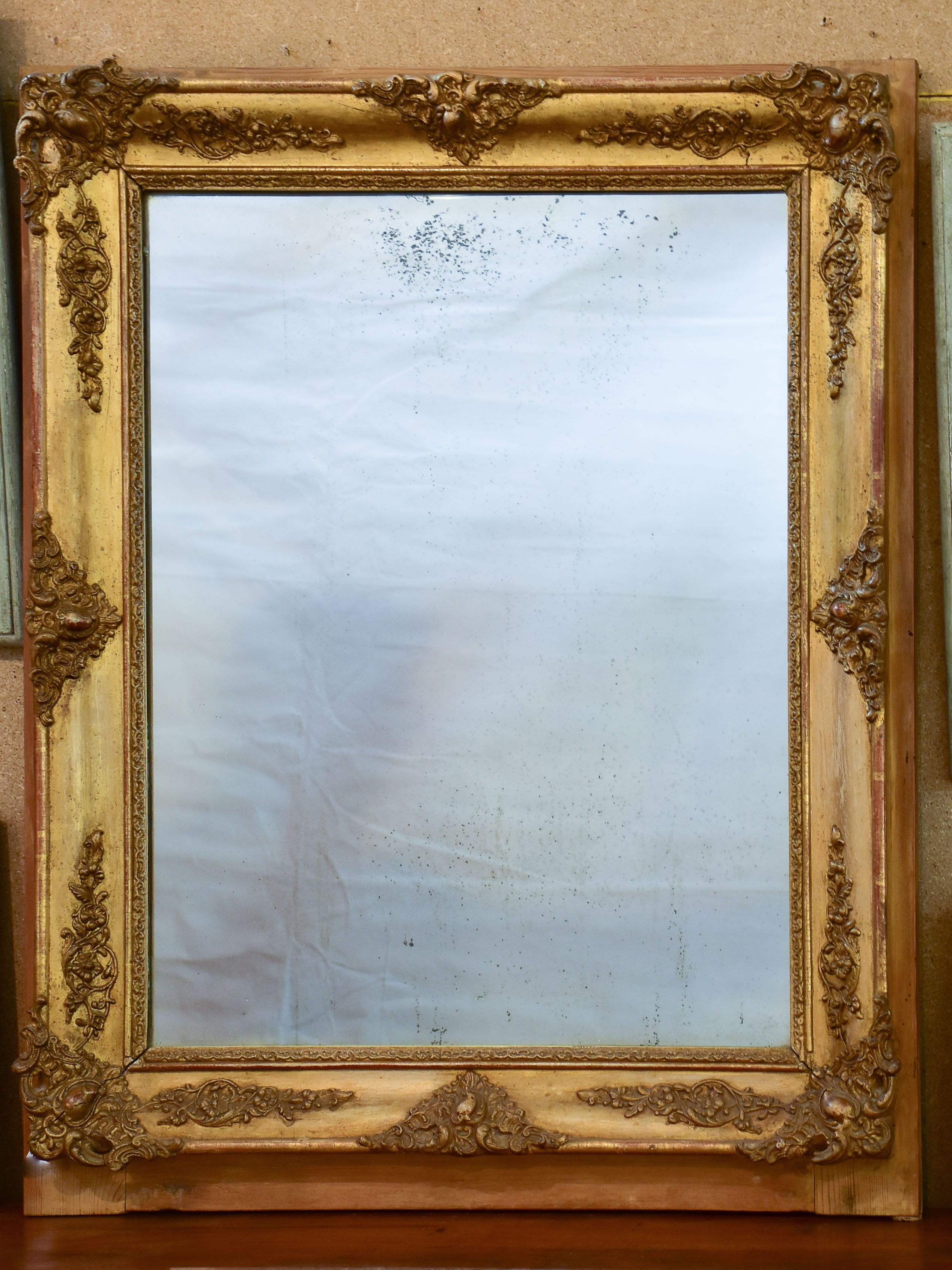 Antique French Louis XVI mirror with gilded frame