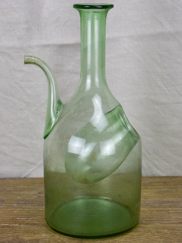 Antique French glass pouring bottle