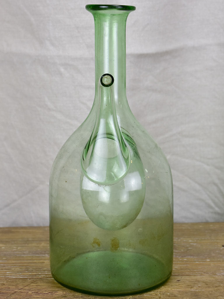 Antique French glass pouring bottle