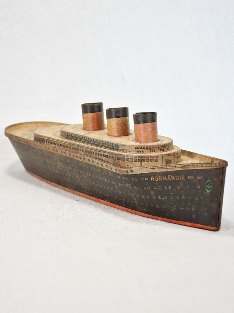 Biscuit tin in the shape of a ship from Normandy - 1930s 18"
