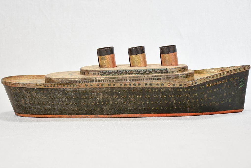 Biscuit tin in the shape of a ship from Normandy - 1930s 18"