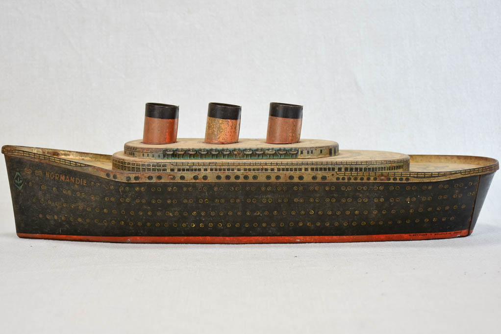 Biscuit tin in the shape of a ship from Normandy - 1930s 18"