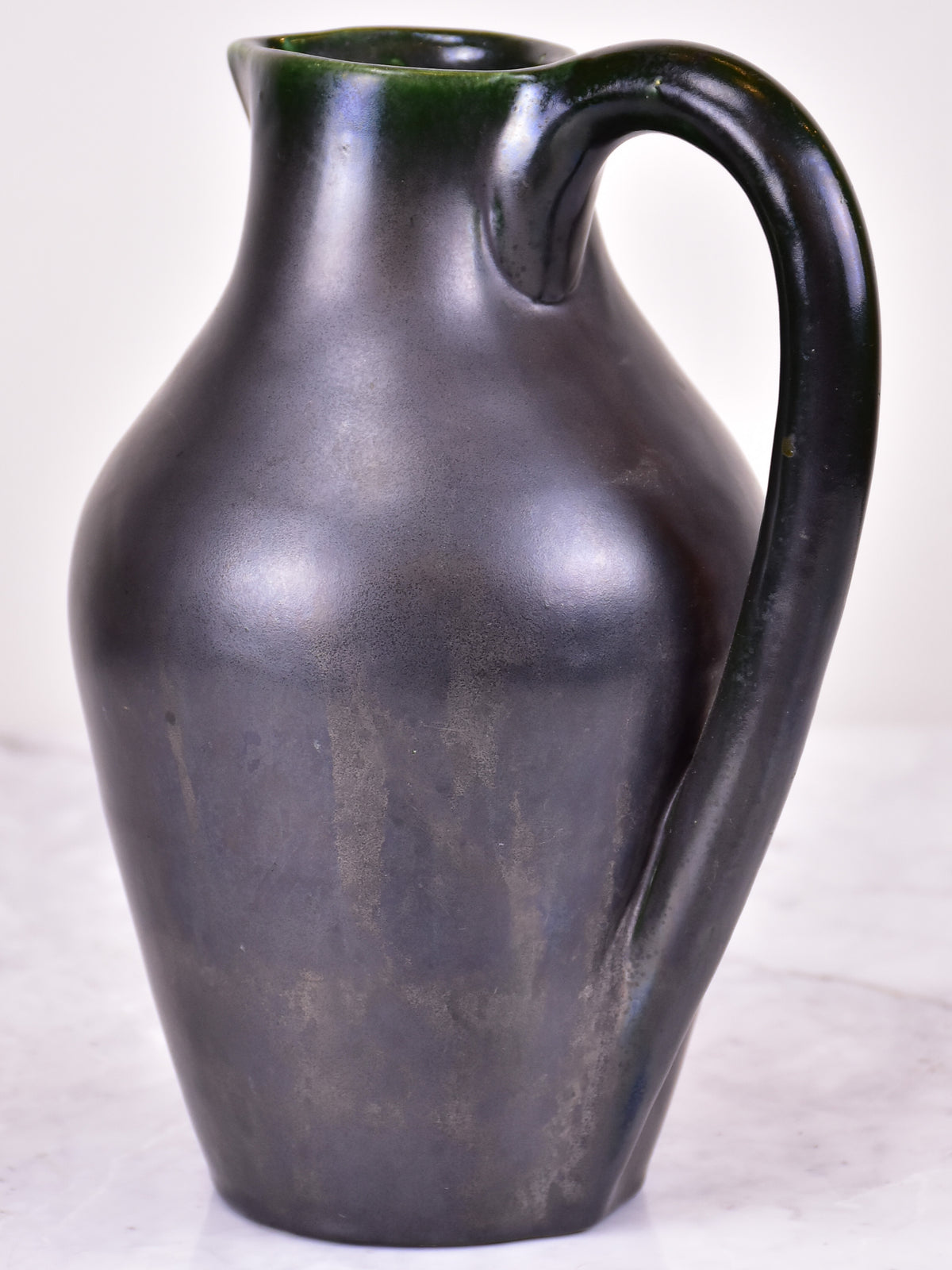 Black mid-century jug signed OUDIN