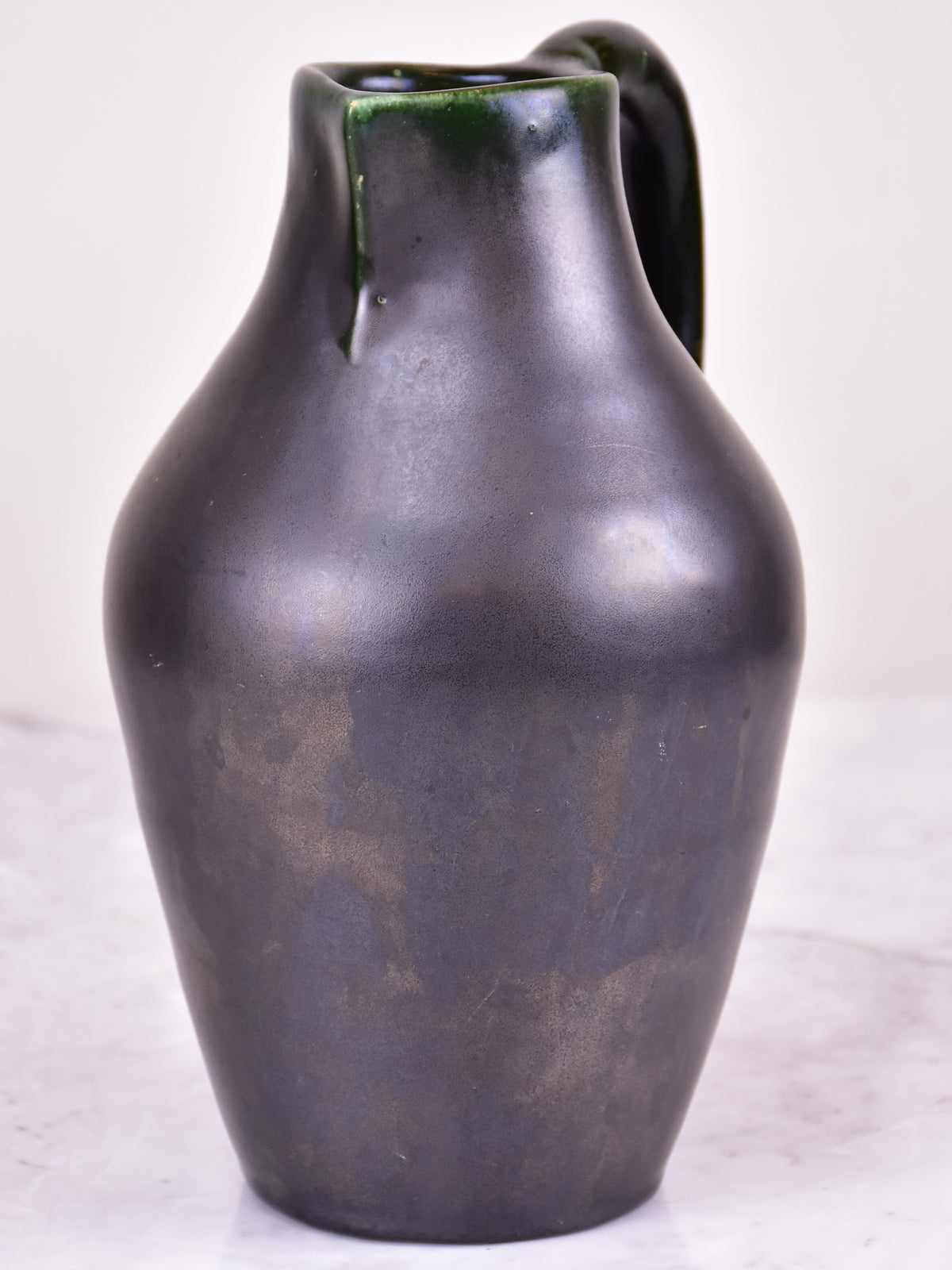 Black mid-century jug signed OUDIN