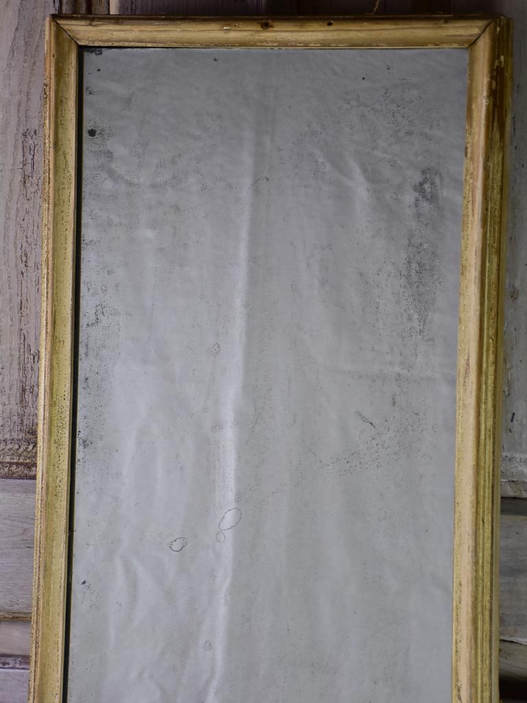 Large early 20th-century rectangular mirror with light wood frame and original glass 69¾" x 17¼"