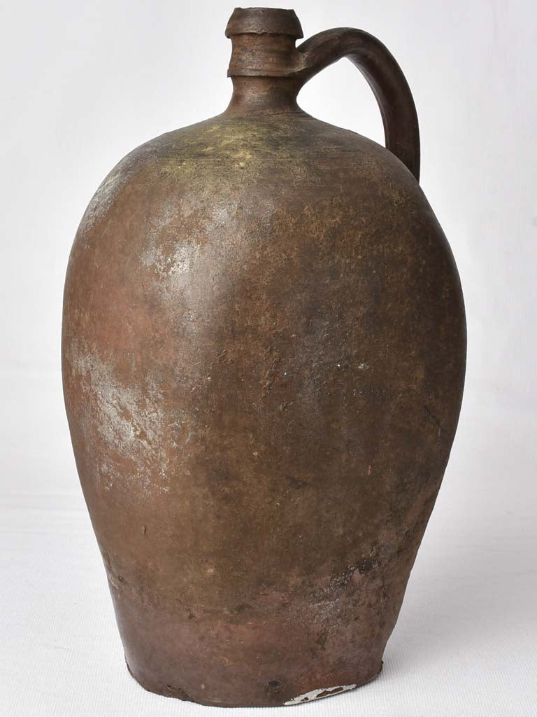 Unique flat-sided storage pottery jug