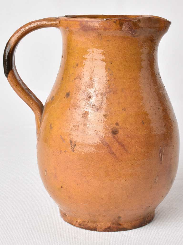Antique French pitcher with ocher glaze 8¾"