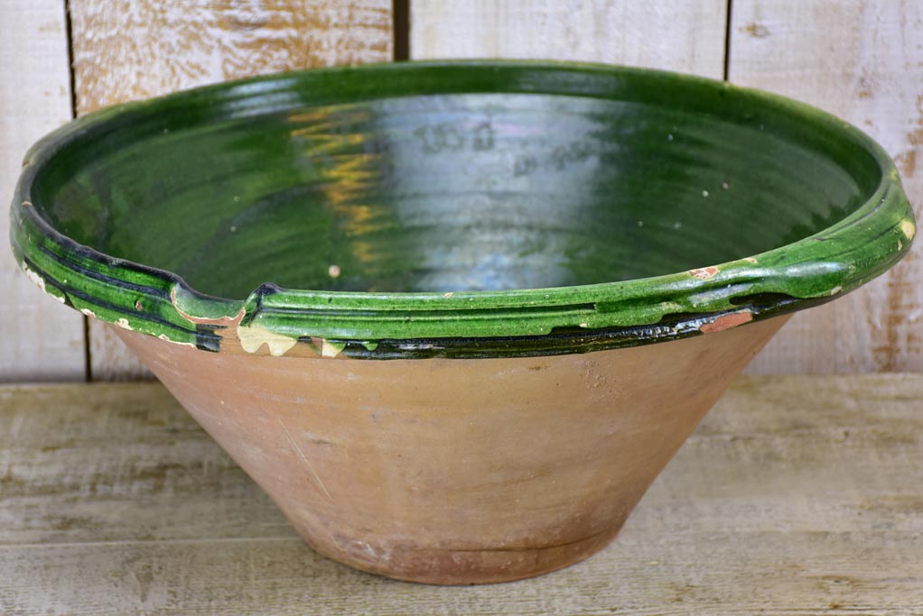 Large antique French ceramic bowl / tian with green glaze