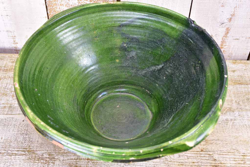 Large antique French ceramic bowl / tian with green glaze