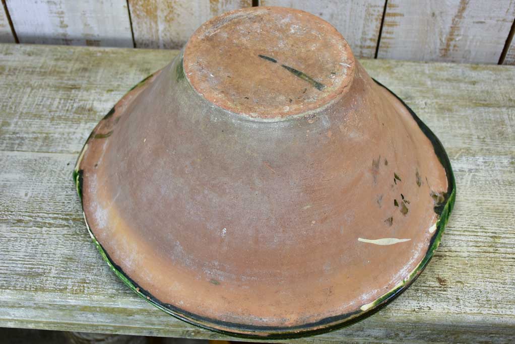 Large antique French ceramic bowl / tian with green glaze