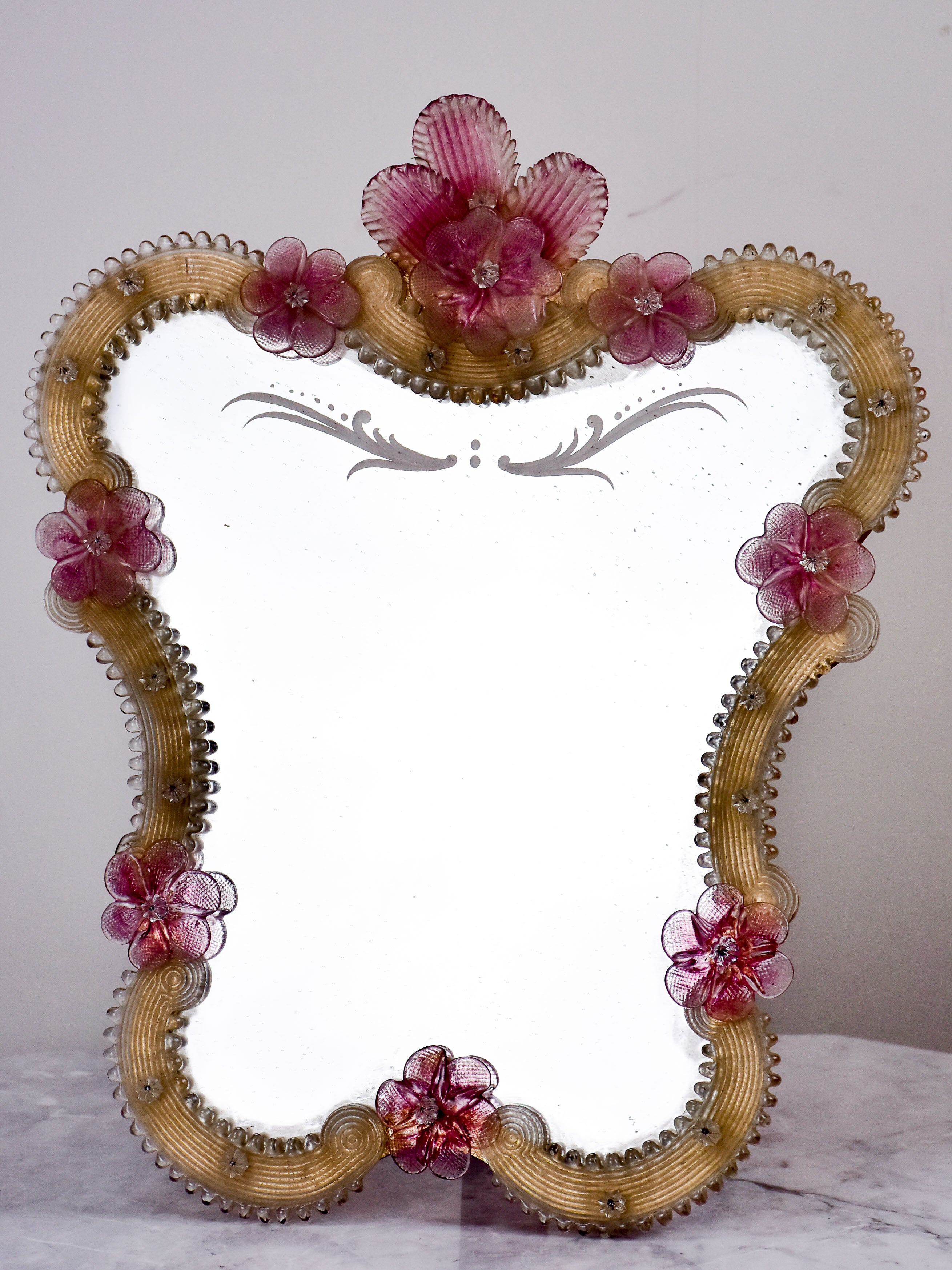 Small antique Venetian mirror with pink flowers