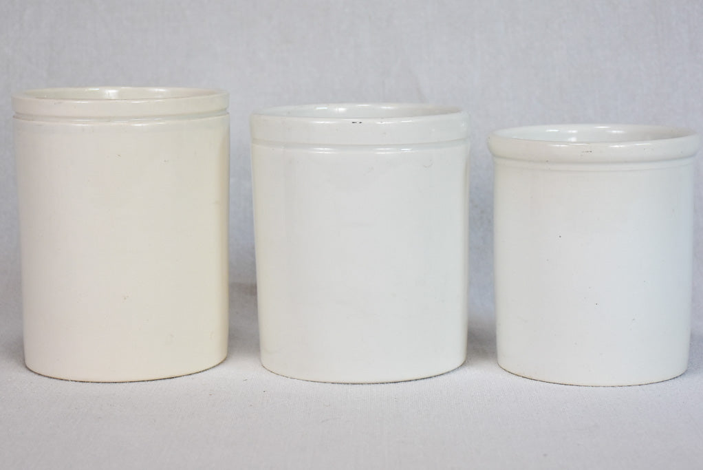 Collection of 3 white ceramic preserving pots