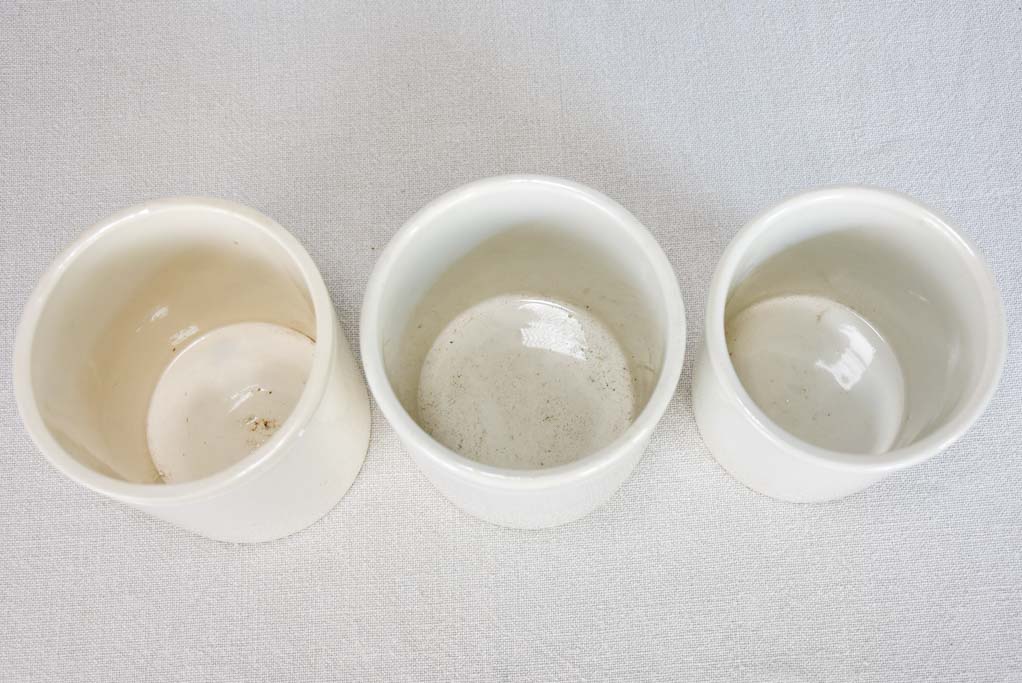 Collection of 3 white ceramic preserving pots