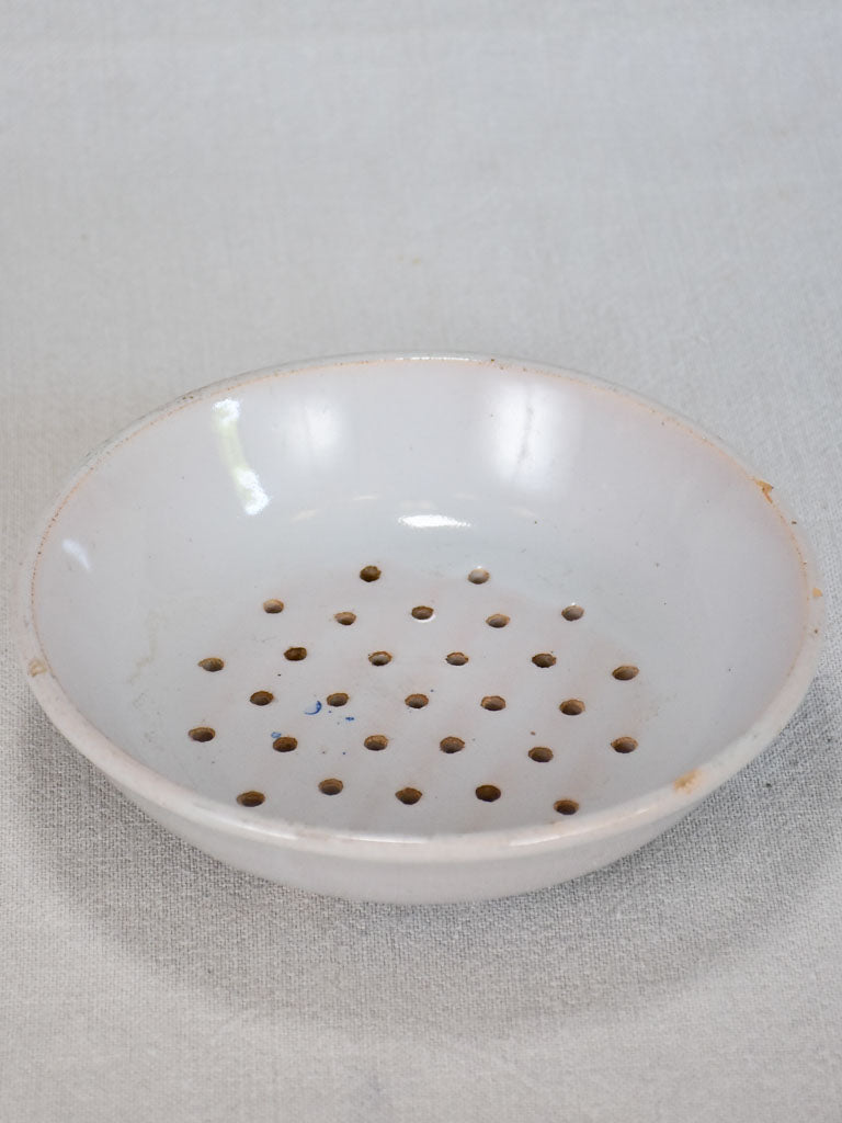 Early 20th-century French strainer plate for strawberries 8"