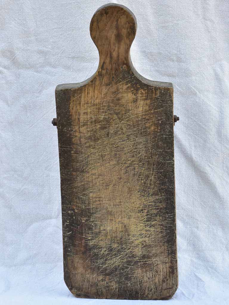 Chunky antique French cutting board with bolts 24" x 9"
