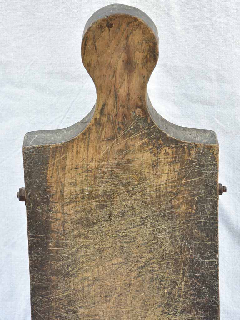 Chunky antique French cutting board with bolts 24" x 9"