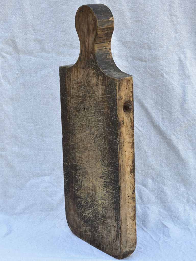 Chunky antique French cutting board with bolts 24" x 9"