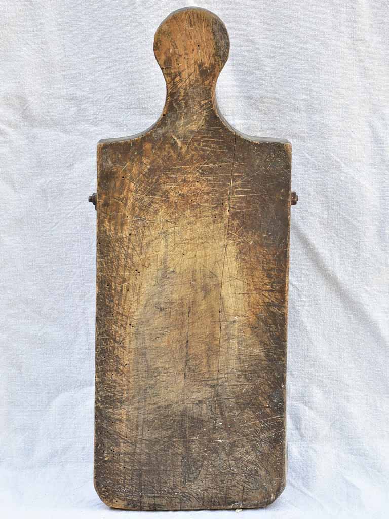 Chunky antique French cutting board with bolts 24" x 9"