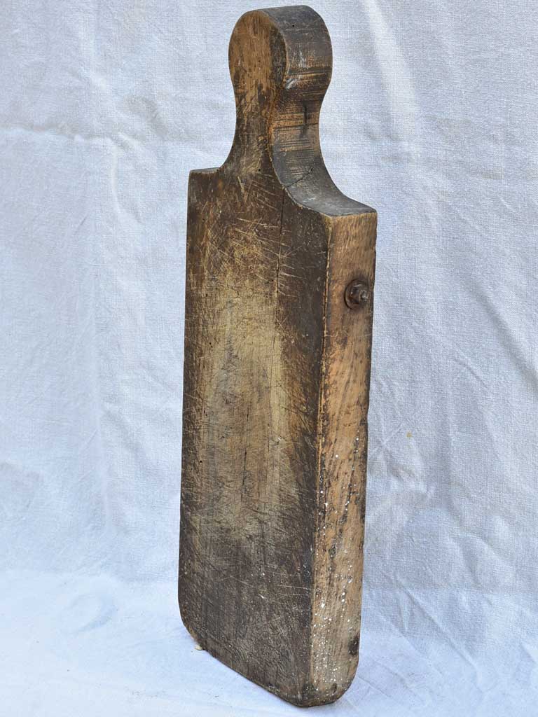 Chunky antique French cutting board with bolts 24" x 9"