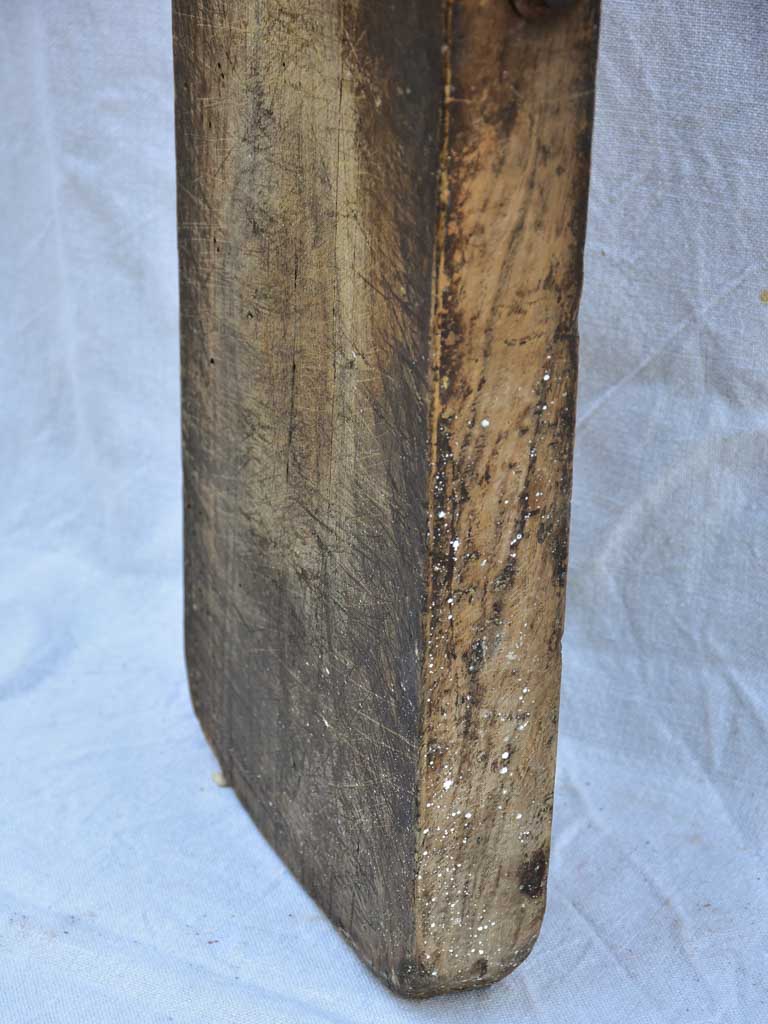 Chunky antique French cutting board with bolts 24" x 9"