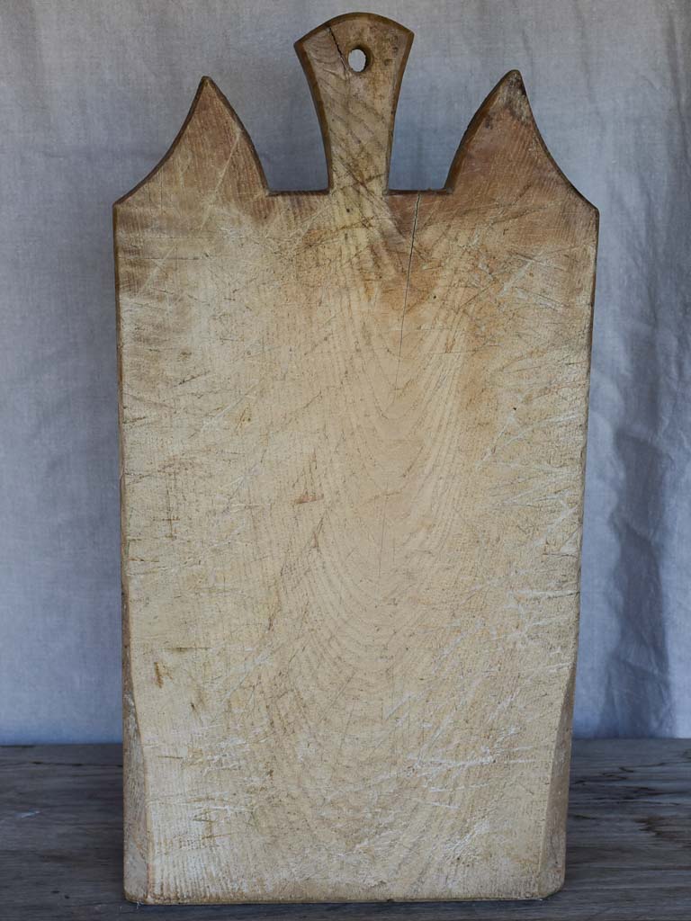 Antique French cutting board with dog ear shoulders 21¾"