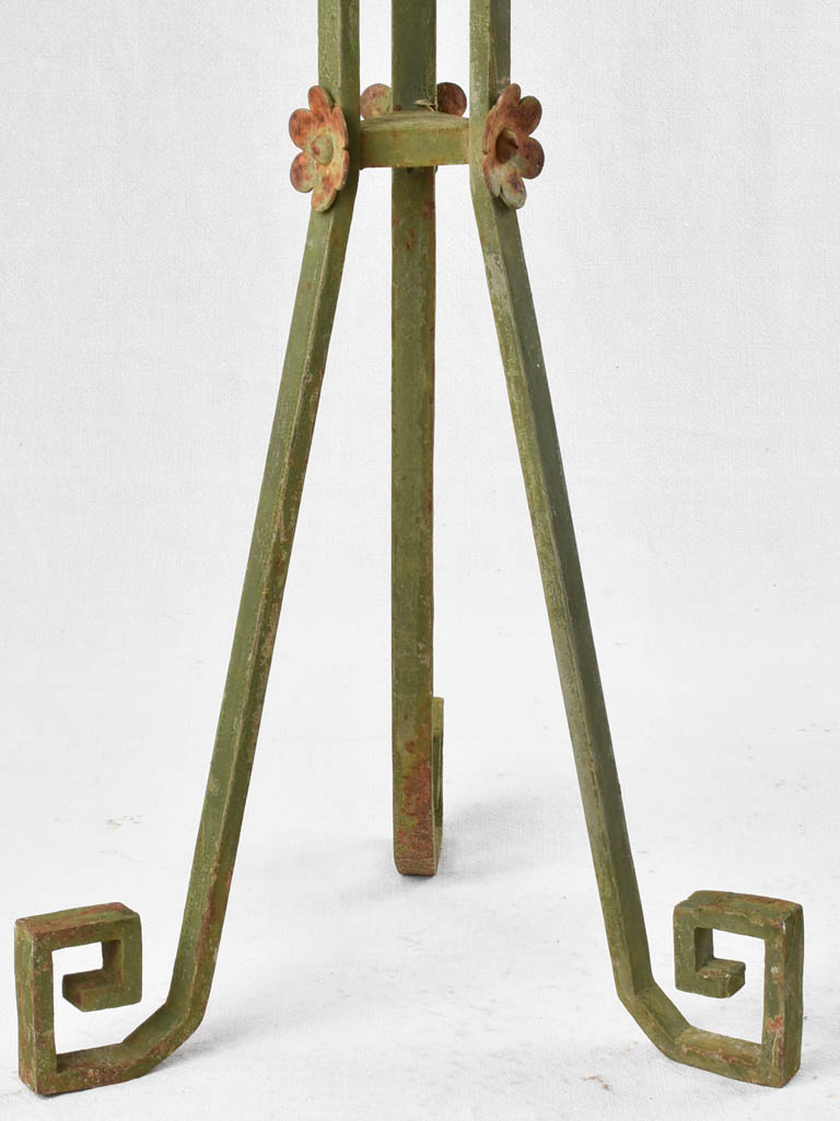 Weathered garden stand with flower decorations