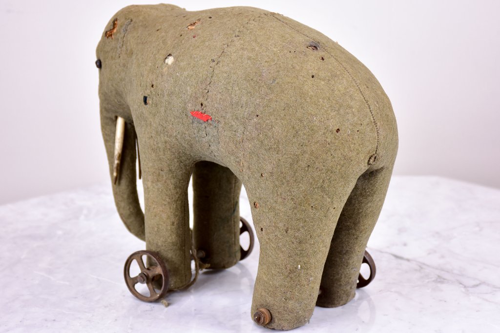 Three antique French toy elephants