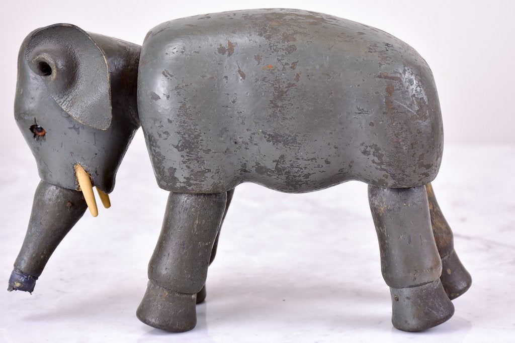 Three antique French toy elephants