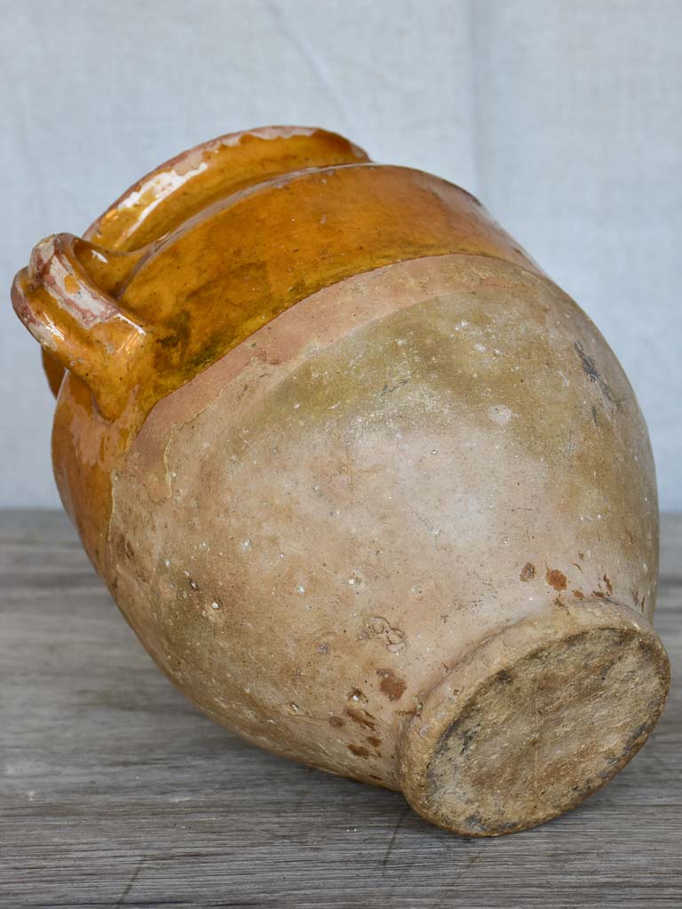 Small antique French confit pot with yellow / orange glaze 7½"