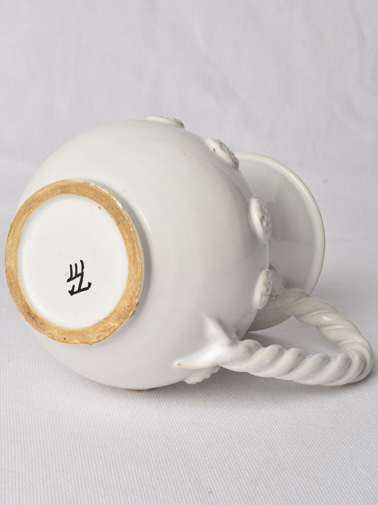 Vintage Tessier pottery with foliage decor