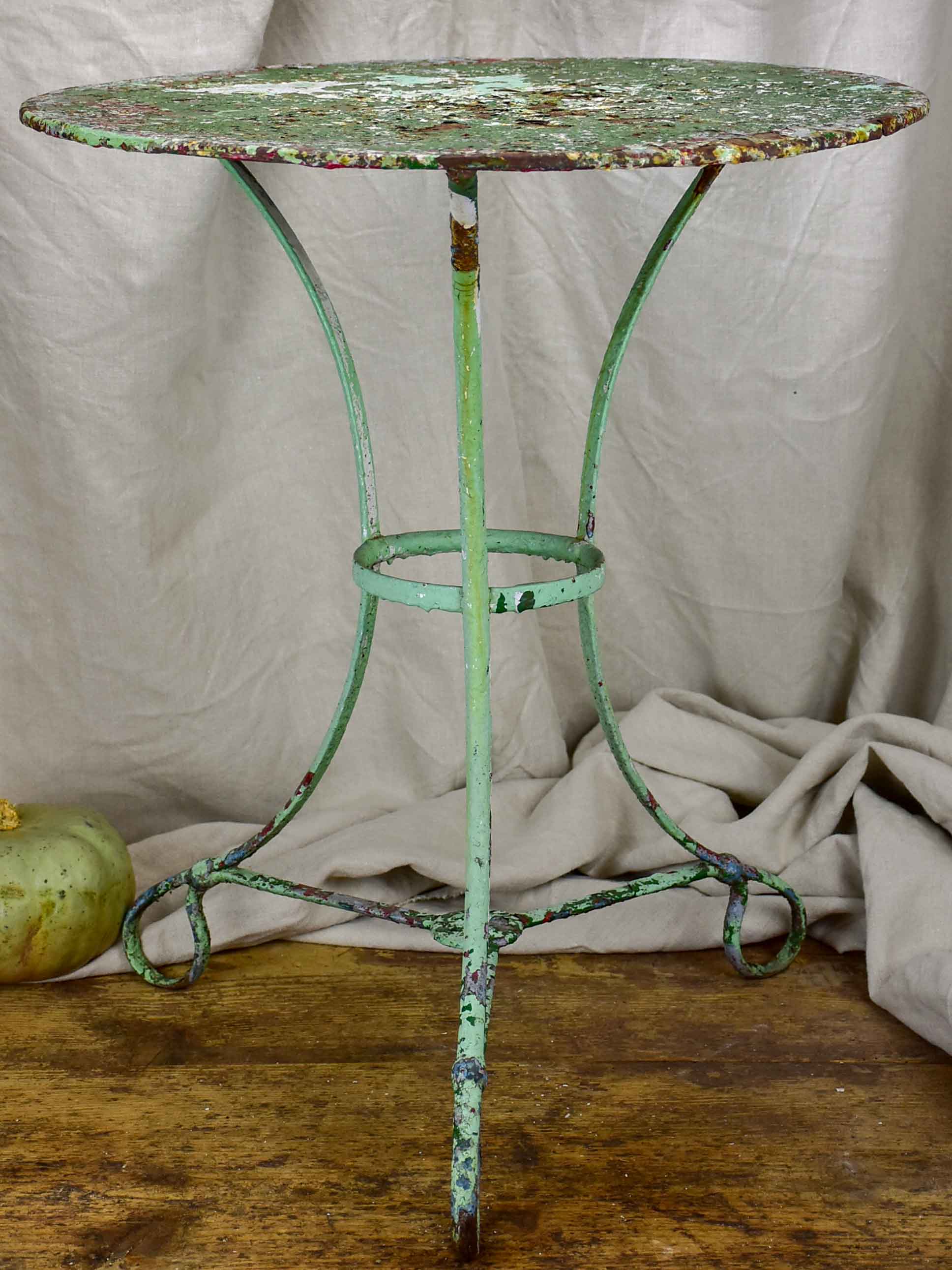Antique French garden table with green patina