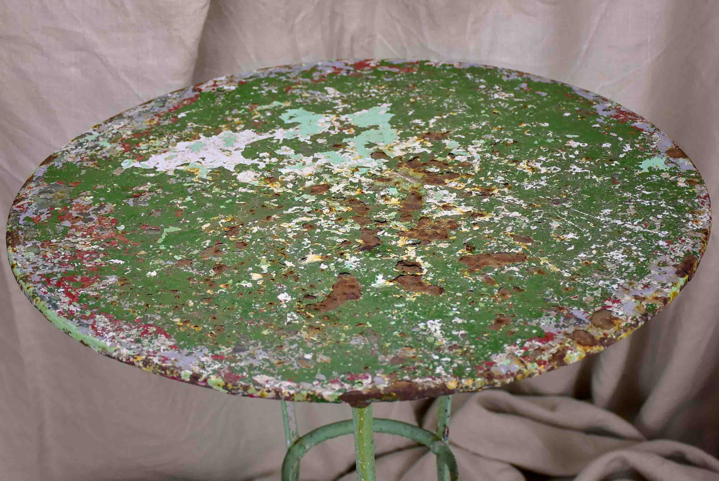 Antique French garden table with green patina