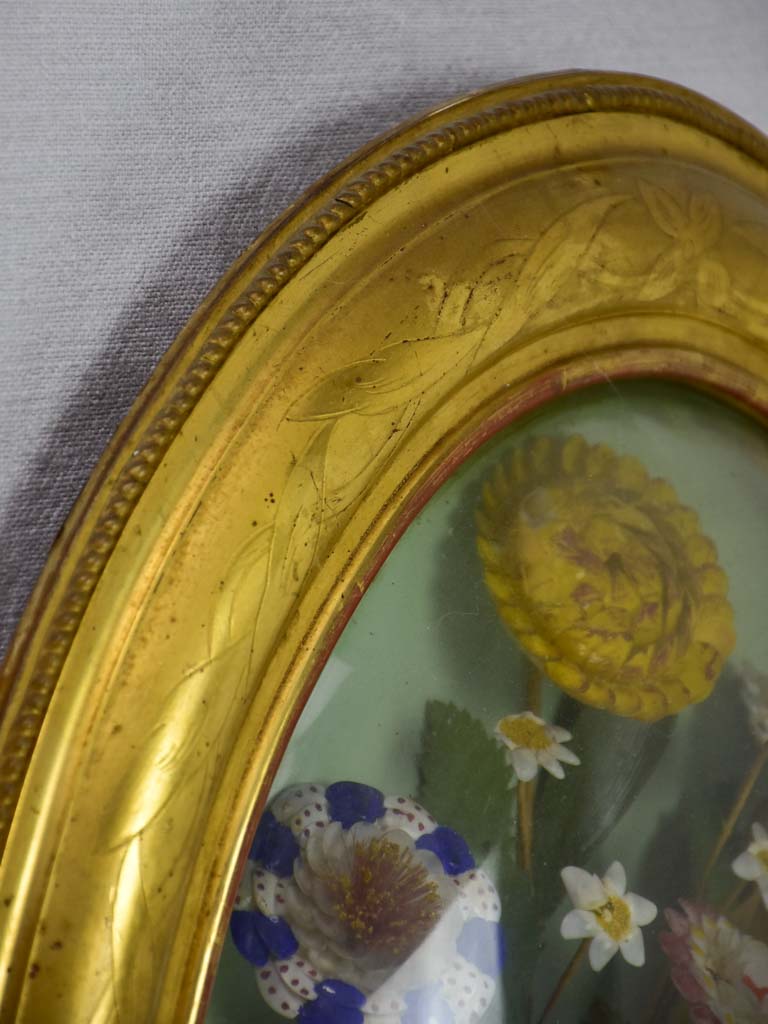 Napoleon III wedding shell bouquet in gilt oval frame with convex glass 20½" x 17¼"