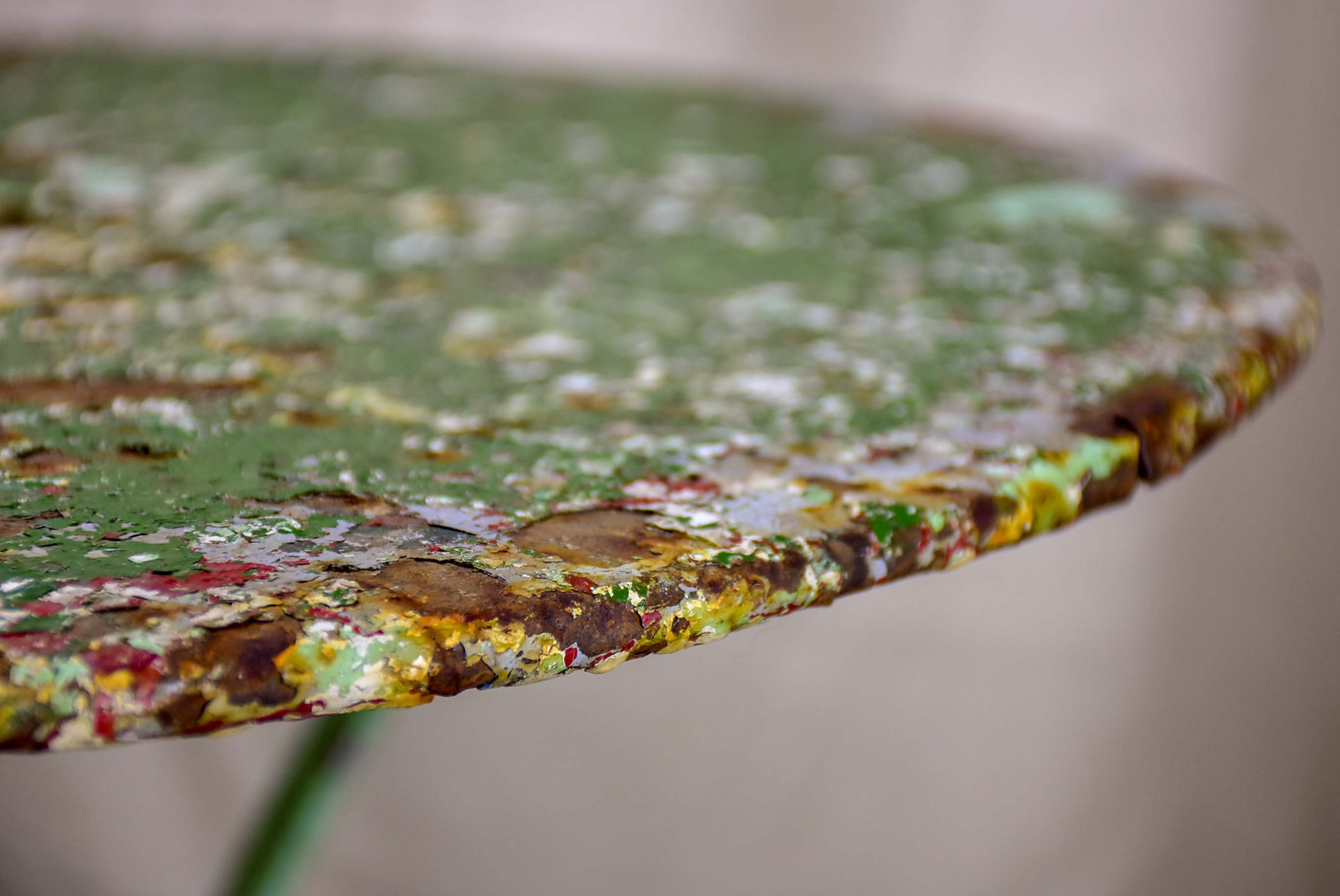 Antique French garden table with green patina